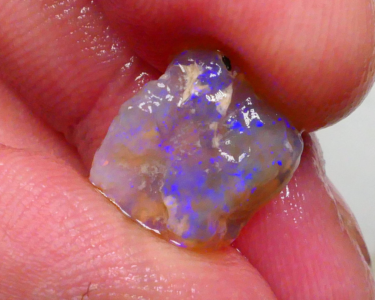 Dark Crystal knobby 4.10cts Thick Bar relative to its size loaded with confetti flashes of blues 13x11x4mm Lot B4-A491