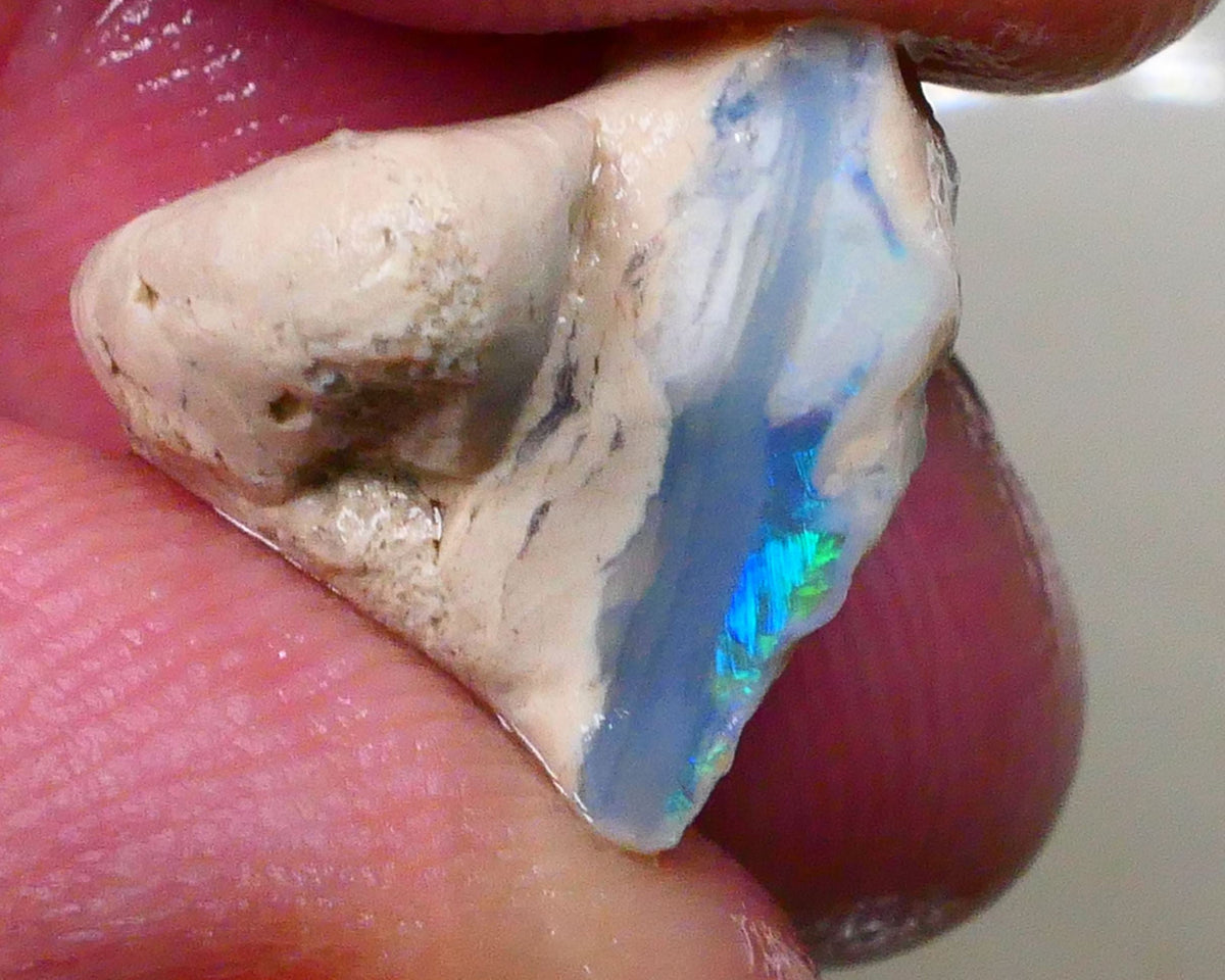 Lightning ridge Dark Base Seam opal formation with clay/sand host rock 11.00cts Bright Greens /.Blues in small bit of bar 15x15x9mm Lot B4-A511