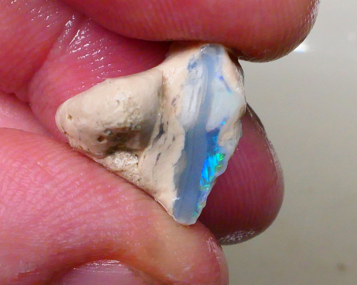 Lightning ridge Dark Base Seam opal formation with clay/sand host rock 11.00cts Bright Greens /.Blues in small bit of bar 15x15x9mm Lot B4-A511