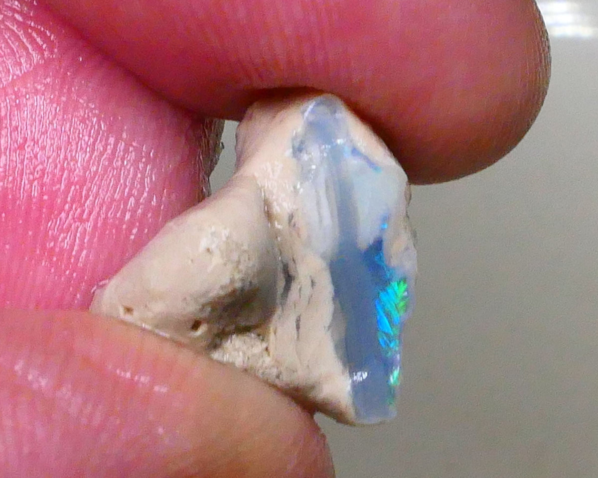 Lightning ridge Dark Base Seam opal formation with clay/sand host rock 11.00cts Bright Greens /.Blues in small bit of bar 15x15x9mm Lot B4-A511