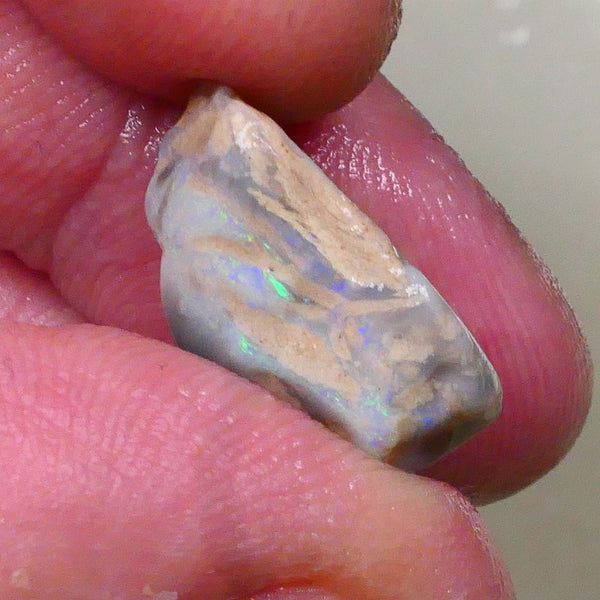 Tumbled Dark base knobby opal rough 10.50cts Stacked colour bars showing some Multifires 18x14x8mm  Lot B4-A518