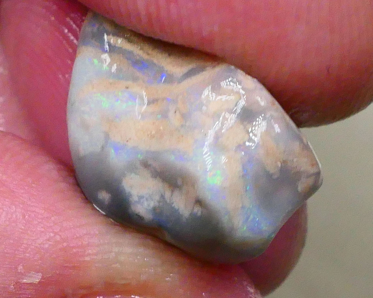 Tumbled Dark base knobby opal rough 10.50cts Stacked colour bars showing some Multifires 18x14x8mm  Lot B4-A518