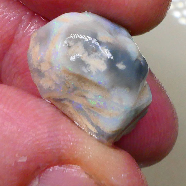 Tumbled Dark base knobby opal rough 10.50cts Stacked colour bars showing some Multifires 18x14x8mm  Lot B4-A518