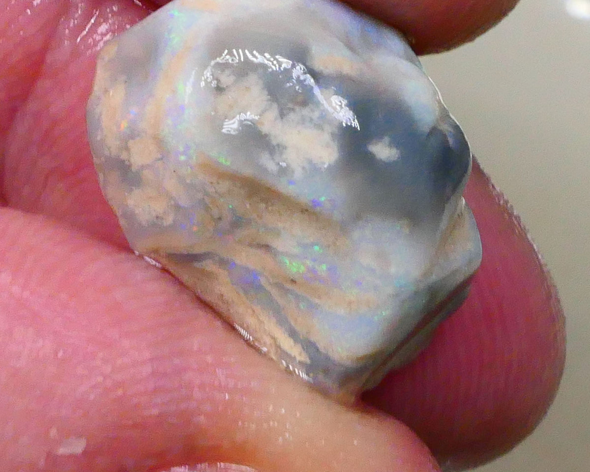 Tumbled Dark base knobby opal rough 10.50cts Stacked colour bars showing some Multifires 18x14x8mm  Lot B4-A518