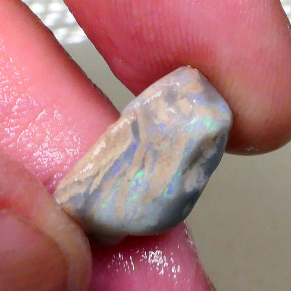 Tumbled Dark base knobby opal rough 10.50cts Stacked colour bars showing some Multifires 18x14x8mm  Lot B4-A518