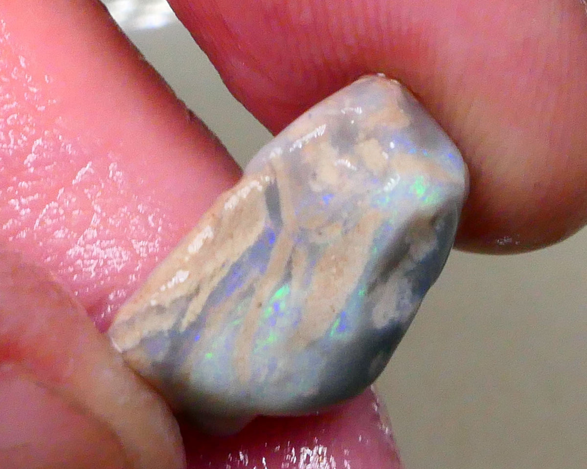 Tumbled Dark base knobby opal rough 10.50cts Stacked colour bars showing some Multifires 18x14x8mm  Lot B4-A518