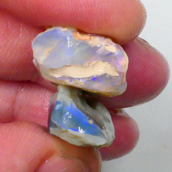Pair of Lightning Ridge Dark Base Knobby opal rough 25.00cts blue colours to chase 21x16x10mm & 17x12x10mm Lot B4-A535