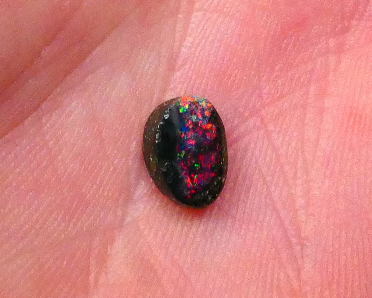 Red dominant Fires on this solid Winton Boulder Opal Gemstone 1.30cts Ready to set 8x5x3mm Lot B4-A523