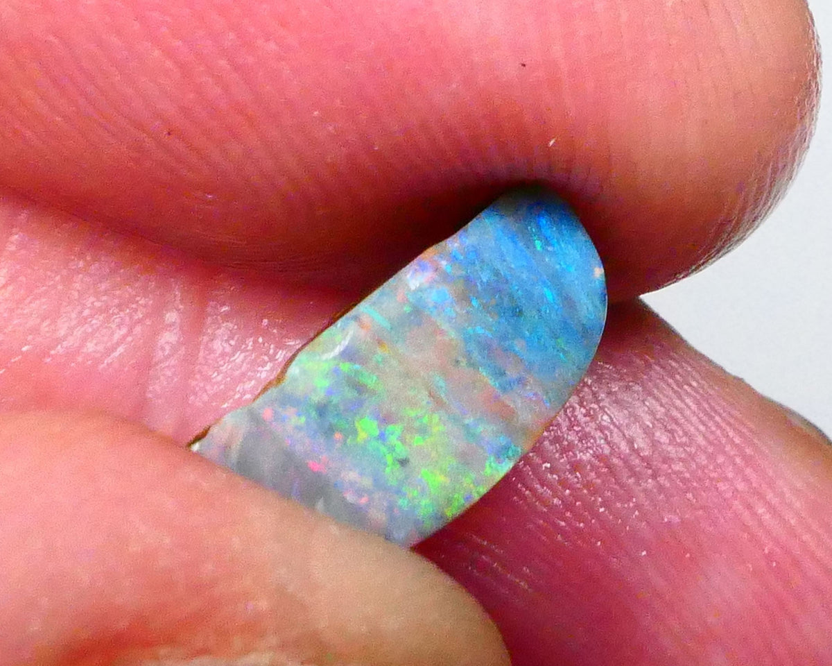 Yellow/Green/Blue dominant Multifires Stunning Full Face 3.15cts rub/rough of Winton Easy finish for all cutters 12x5x4mm  Lot B4-A555