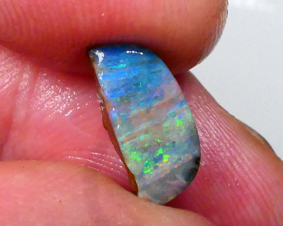 Yellow/Green/Blue dominant Multifires Stunning Full Face 3.15cts rub/rough of Winton Easy finish for all cutters 12x5x4mm  Lot B4-A555
