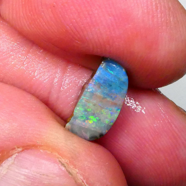 Yellow/Green/Blue dominant Multifires Stunning Full Face 3.15cts rub/rough of Winton Easy finish for all cutters 12x5x4mm  Lot B4-A555