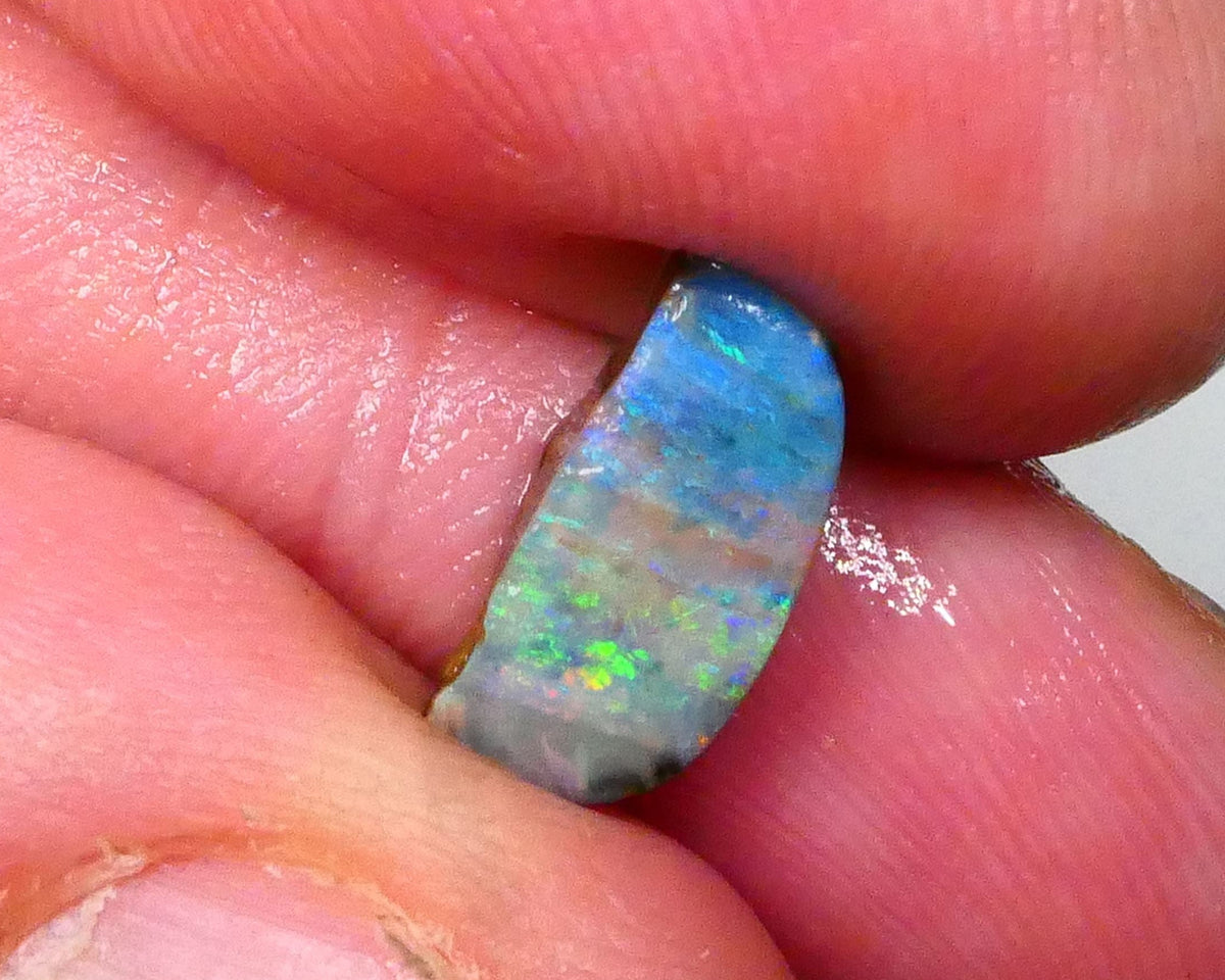 Yellow/Green/Blue dominant Multifires Stunning Full Face 3.15cts rub/rough of Winton Easy finish for all cutters 12x5x4mm  Lot B4-A555