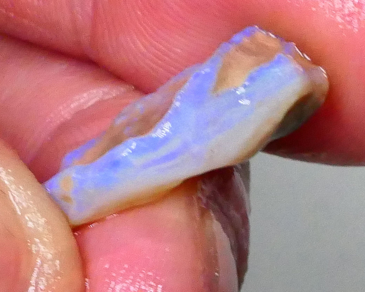 Coober Pedy Crystal Seam opal rough 7.70cts nice bar loaded with blues 22x12x7mm  Lot B4-A556