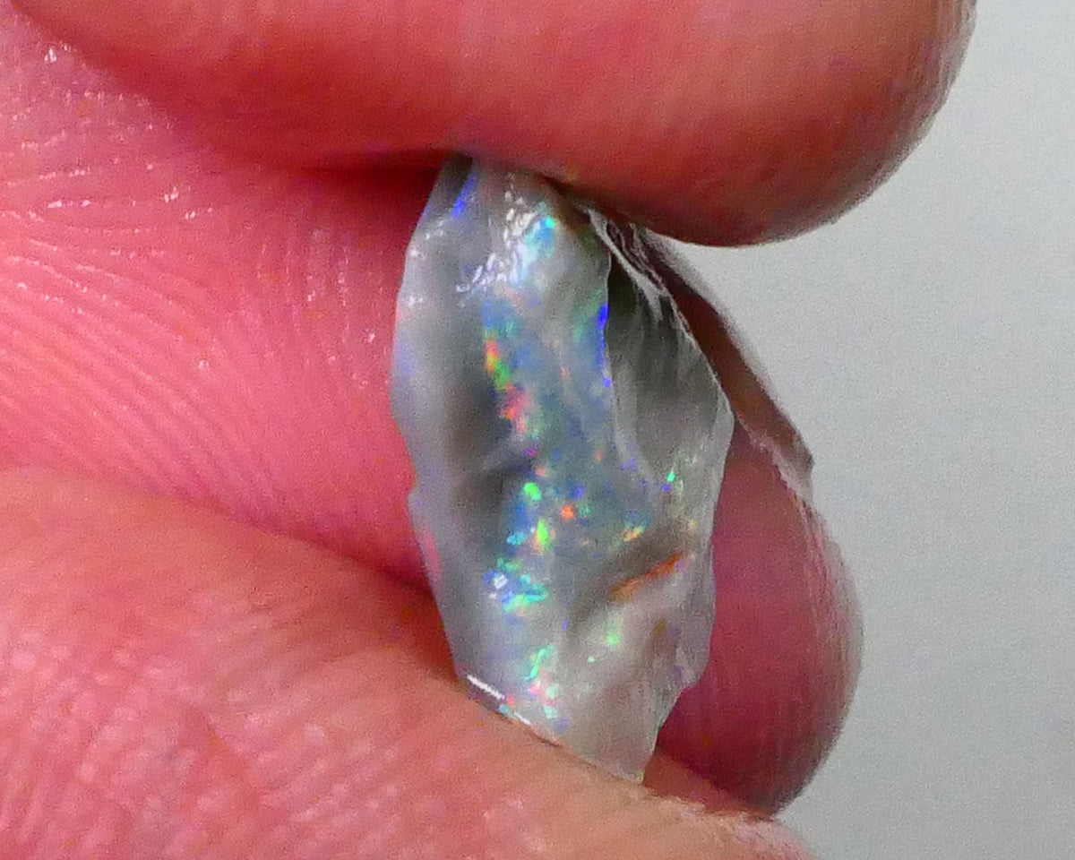 Gorgeous Rainbow bar with Reds 2.15cts Small size Lightning Ridge Dark Base Seam opal rough to gamble cut 13x8x3mm Lot B4-A569