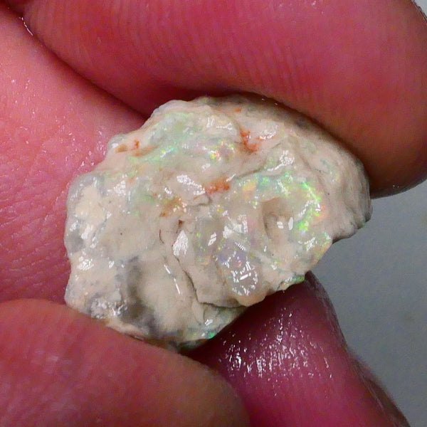yellow/blue/green Multifires on this 8.50cts Lightning Ridge knobby opal formation rough 20x12x7mm Lot B4-A565