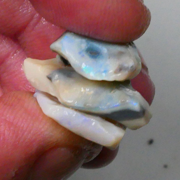 Dark base seam opal rough stack from Lighting Ridge 22.00cts Blues colours in the bars to chase & gamble 24x15x4mm to 17x13x6mm   Lot B4-A563