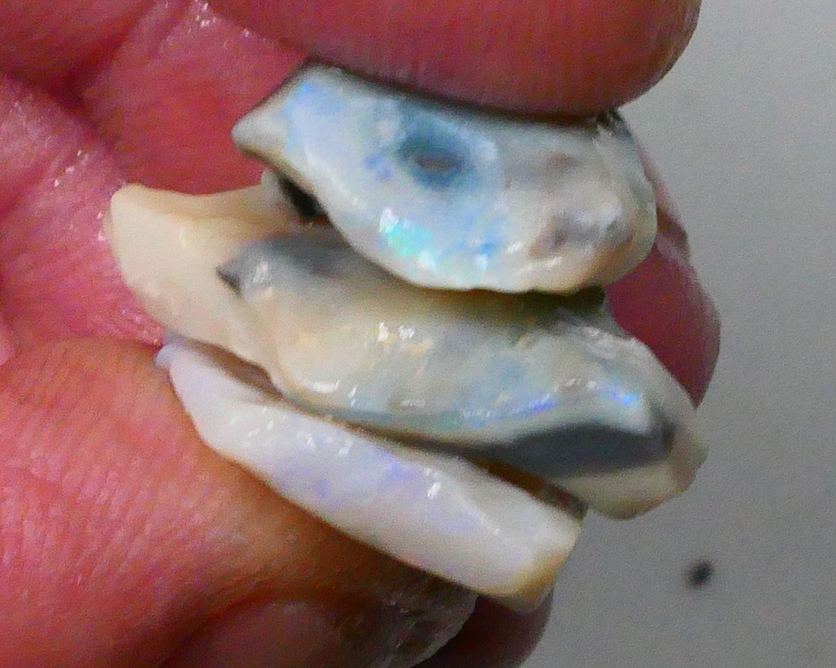 Dark base seam opal rough stack from Lighting Ridge 22.00cts Blues colours in the bars to chase & gamble 24x15x4mm to 17x13x6mm   Lot B4-A563