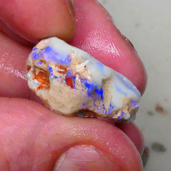 Knobby opal formation rough of Lighting Ridge 23.00cts Bright Blues in bar visible 360 but clay/sand host to work around 25x14x13mm  Lot B4-A580