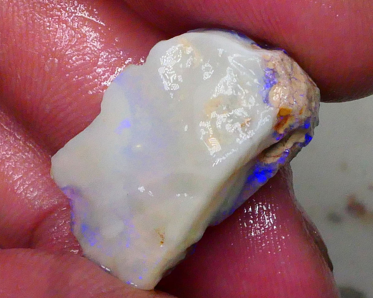 Knobby opal formation rough of Lighting Ridge 23.00cts Bright Blues in bar visible 360 but clay/sand host to work around 25x14x13mm  Lot B4-A580