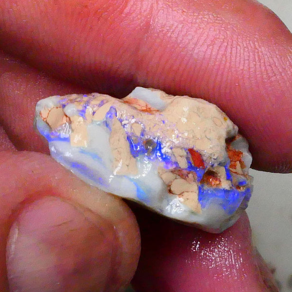 Knobby opal formation rough of Lighting Ridge 23.00cts Bright Blues in bar visible 360 but clay/sand host to work around 25x14x13mm  Lot B4-A580