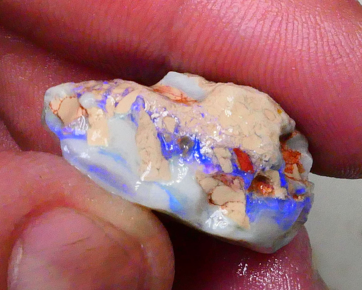 Knobby opal formation rough of Lighting Ridge 23.00cts Bright Blues in bar visible 360 but clay/sand host to work around 25x14x13mm  Lot B4-A580