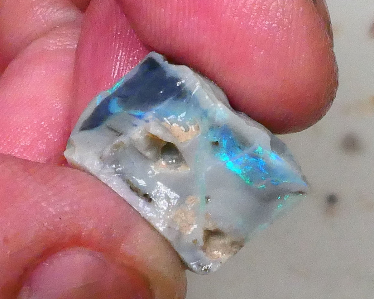 Aqua/Teal/Green/Blue on Dark seam opal rough 17.00cts Bar shows on 2 sides & through top skin but what's inside ? Lightning Ridge cutters Gamble  16x13x11mm Lot B4-A578