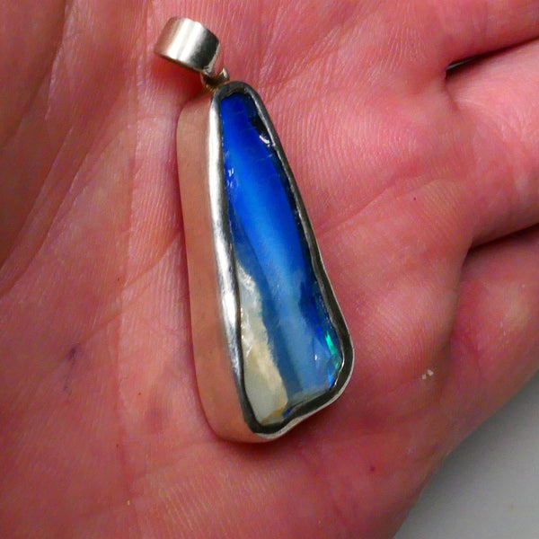 USED !! SETTING FRACTURES ! 39.00cts Total Weight. Sterling Silver custom setting Winton boulder opal Gemstone some bits fires 30x14x7mm   Lot B4-A597