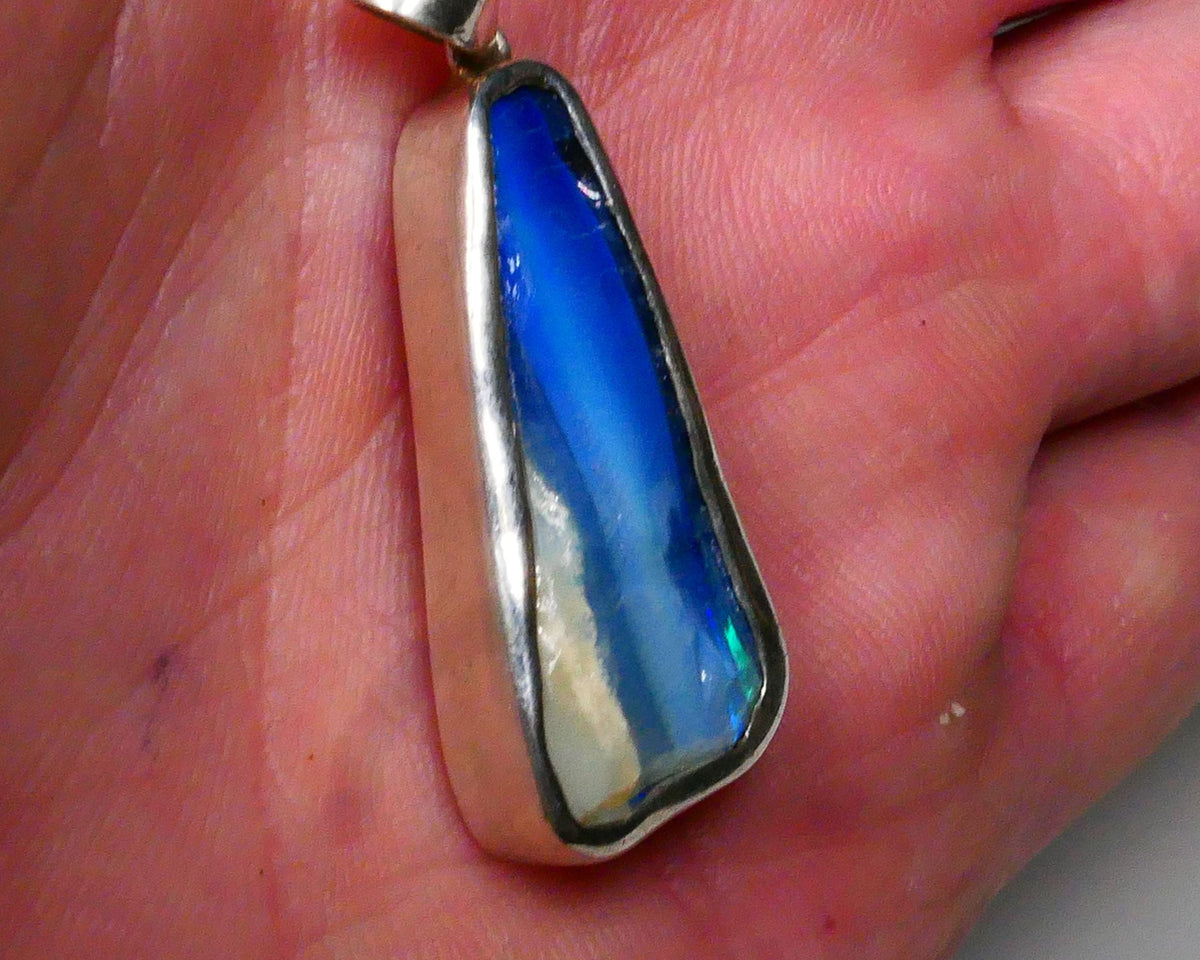 USED !! SETTING FRACTURES ! 39.00cts Total Weight. Sterling Silver custom setting Winton boulder opal Gemstone some bits fires 30x14x7mm   Lot B4-A597