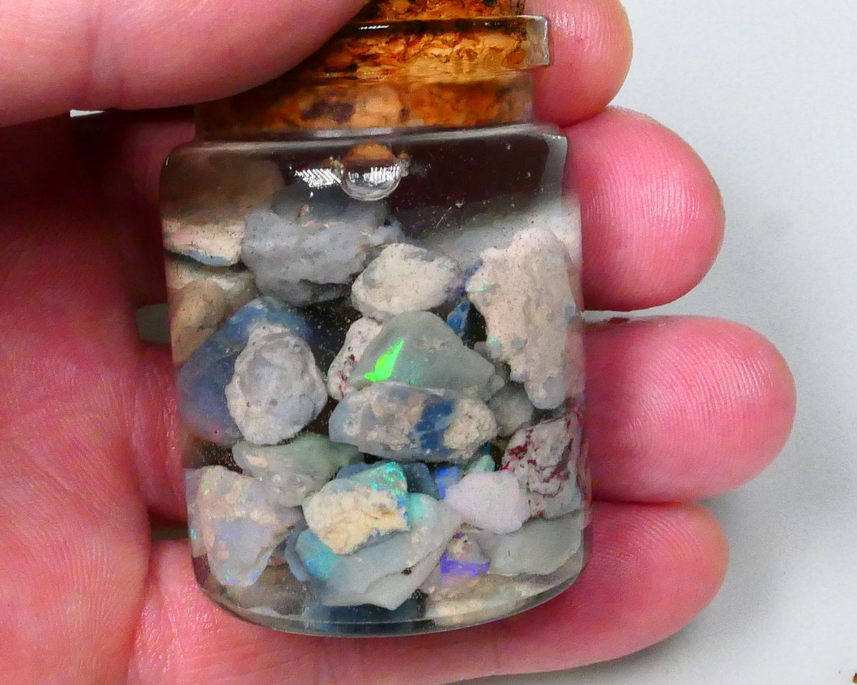 Lightning Ridge Dark Base knobby Fossil Seam rough 140.00cts Potch & Colours/Multicolours 17mm to chip size   Lot B4-A586