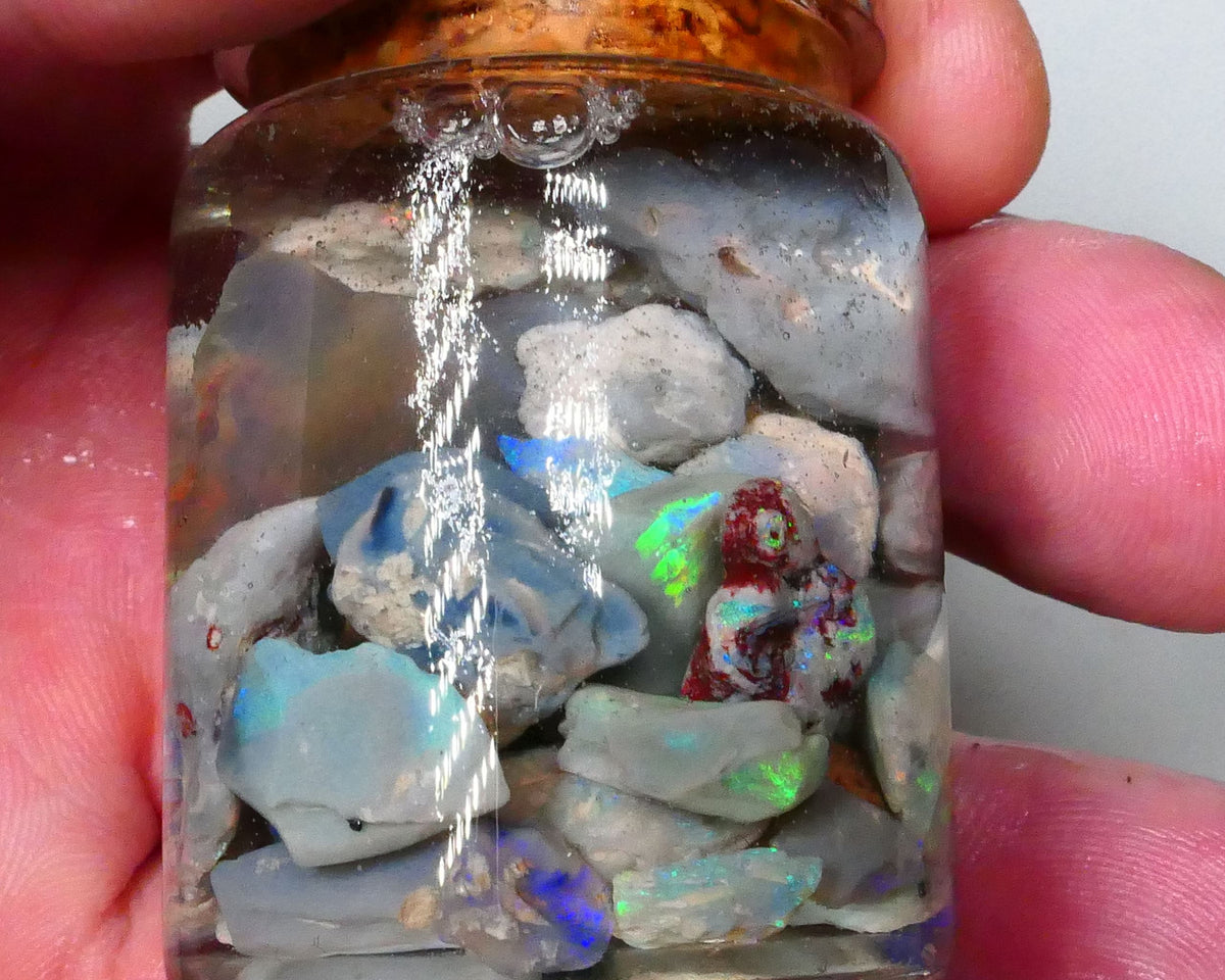 Lightning Ridge Dark Base knobby Fossil Seam rough 140.00cts Potch & Colours/Multicolours 17mm to chip size   Lot B4-A586