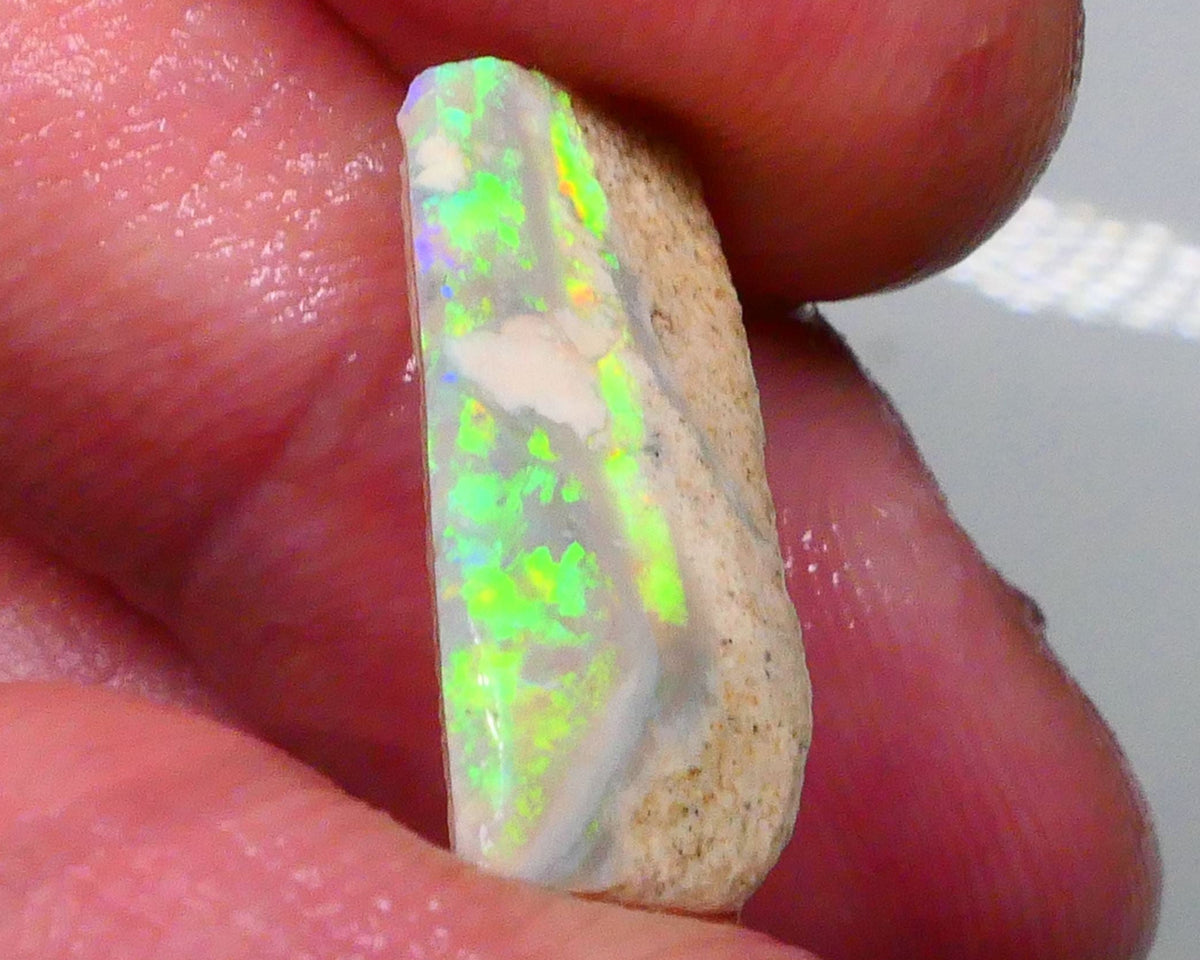 DEAL GEM BRIGHT SEAM RUB  Bling Super Bright Green dominant Fires on this Lightning ridge opal rub 6.95cts 21x9x5mm  Lot B4-A600
