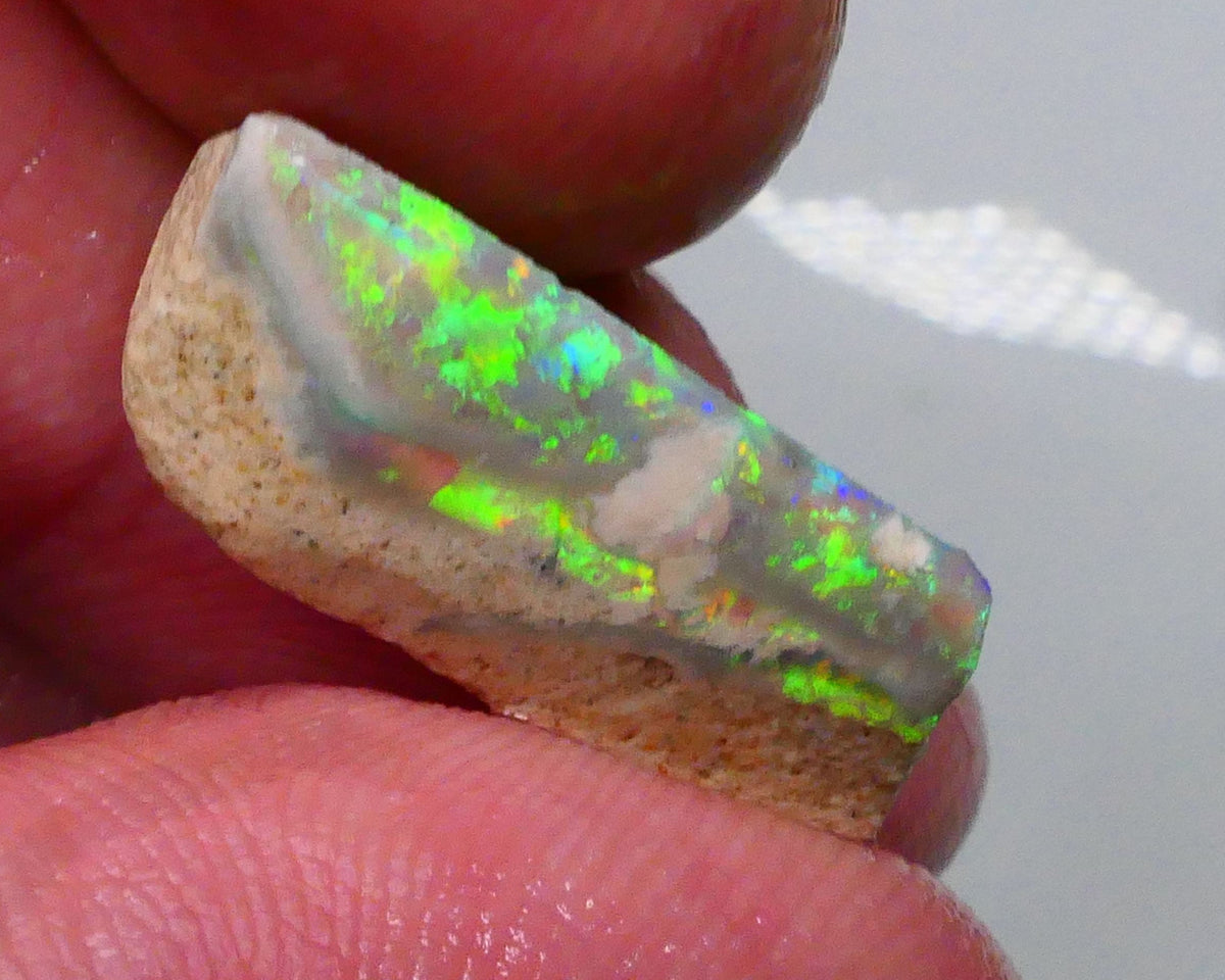 DEAL GEM BRIGHT SEAM RUB  Bling Super Bright Green dominant Fires on this Lightning ridge opal rub 6.95cts 21x9x5mm  Lot B4-A600