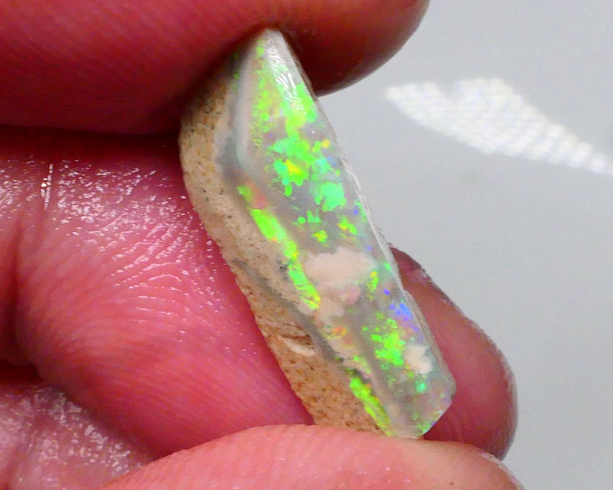 DEAL GEM BRIGHT SEAM RUB  Bling Super Bright Green dominant Fires on this Lightning ridge opal rub 6.95cts 21x9x5mm  Lot B4-A600