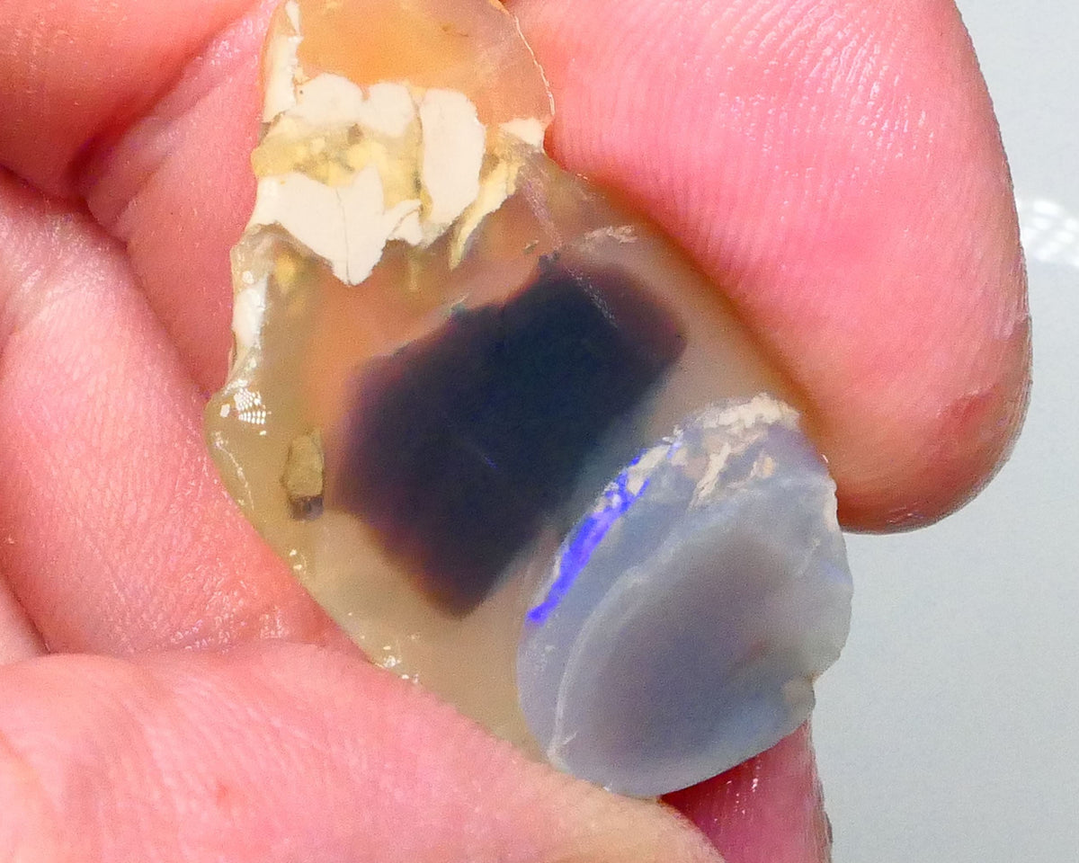 Lighting ridge Knobby opal rough slice 27.00cts  some blues fires in bar to gamble 33x23x6mm  Lot B4-A603