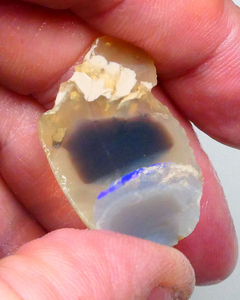 Lighting ridge Knobby opal rough slice 27.00cts  some blues fires in bar to gamble 33x23x6mm  Lot B4-A603