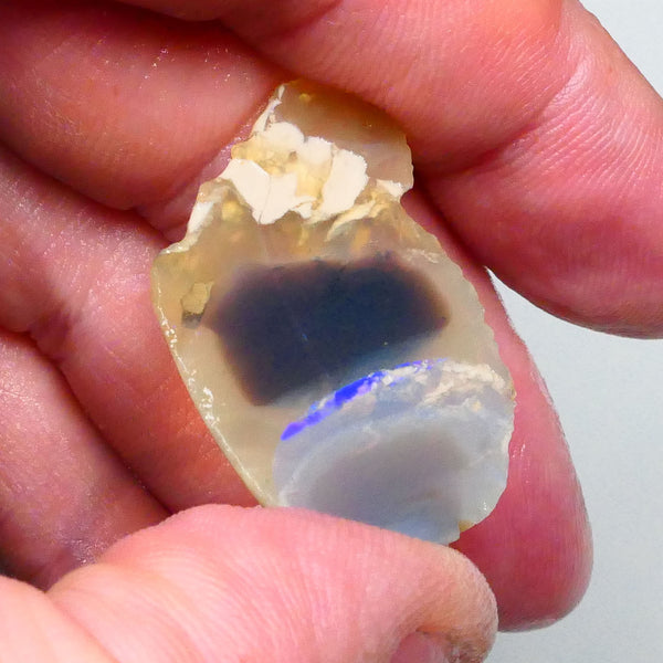 Lighting ridge Knobby opal rough slice 27.00cts  some blues fires in bar to gamble 33x23x6mm  Lot B4-A603