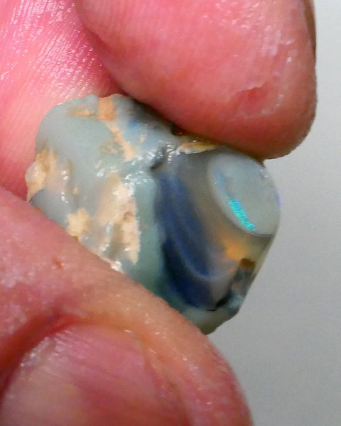 knobby opal slice with small bar exposed 20.00cts Lightning ridge Bright Electric Mint Green Fires in small bar 19x15x14mm  Lot B4-A609