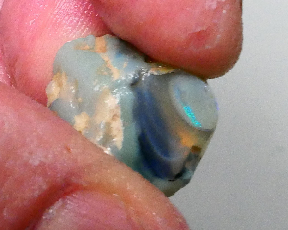 knobby opal slice with small bar exposed 20.00cts Lightning ridge Bright Electric Mint Green Fires in small bar 19x15x14mm  Lot B4-A609