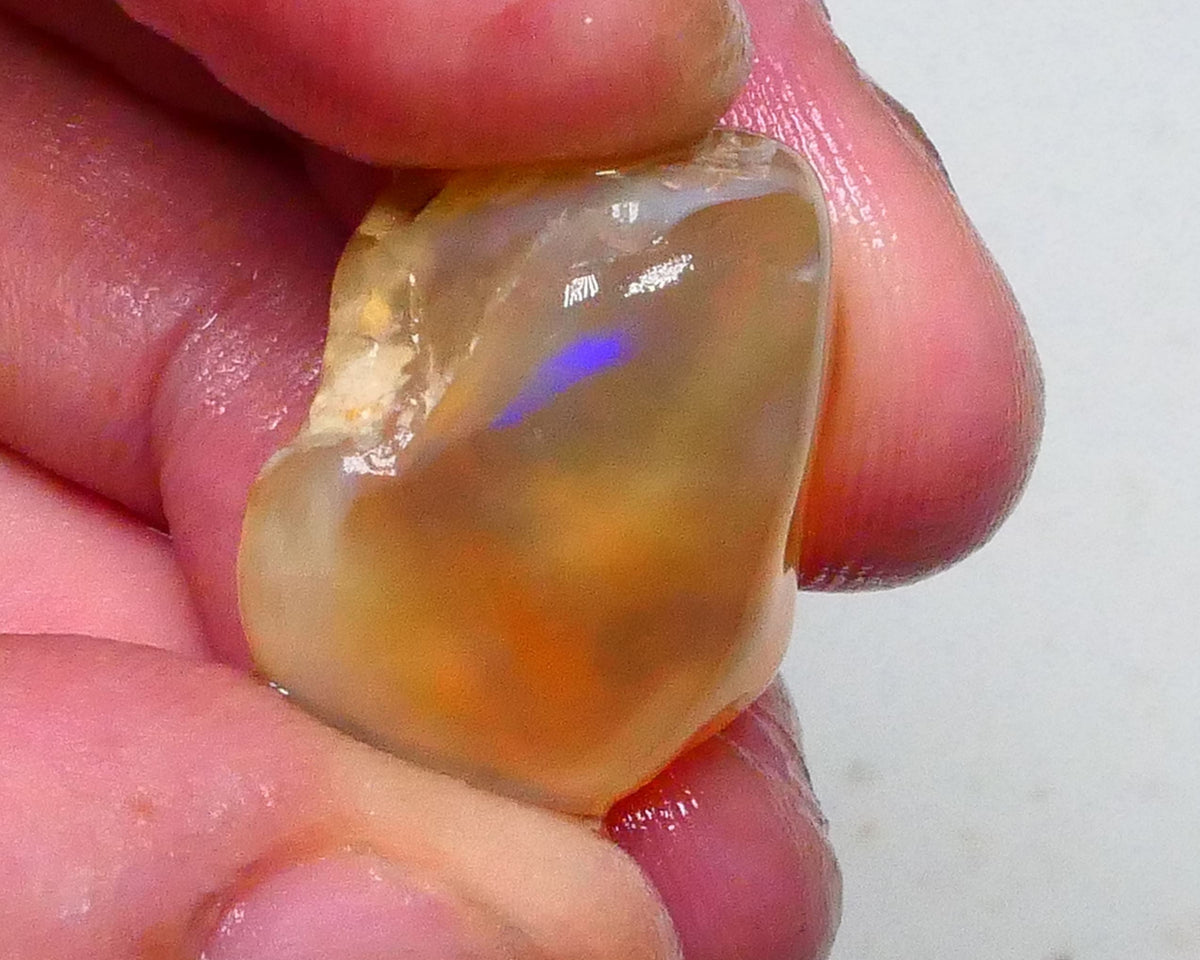 Lightning ridge Amber knobby opal rub/rough 28.00cts blue fire flashes to the Face 20x16x13mm  Lot B4-A612
