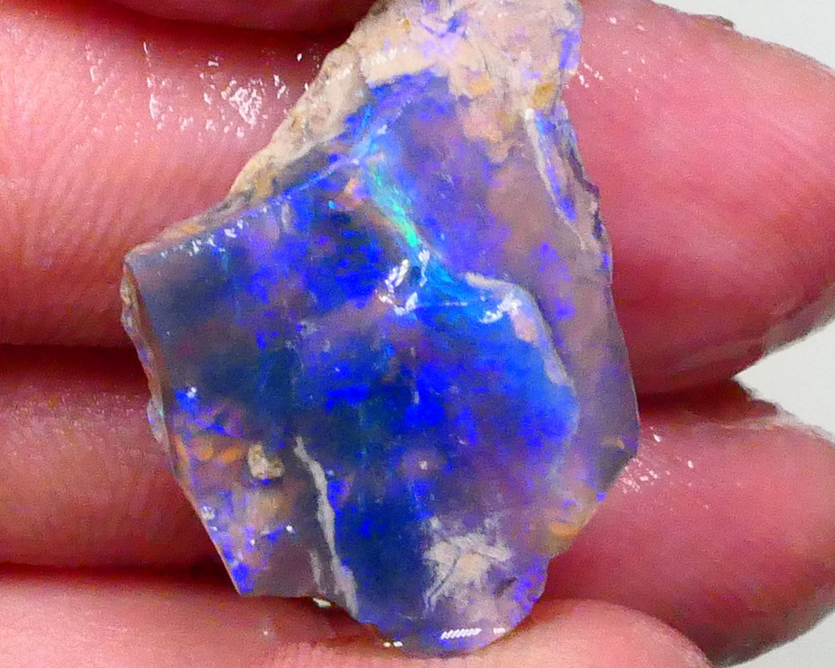 Gorgeous Bright Royal Blues on this Black seam opal rough to cut 8.60cts Lightning Ridge Material 27x18x6mm  Lot B4-A623
