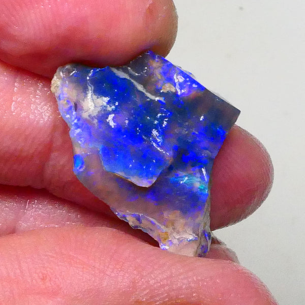 Gorgeous Bright Royal Blues on this Black seam opal rough to cut 8.60cts Lightning Ridge Material 27x18x6mm  Lot B4-A623