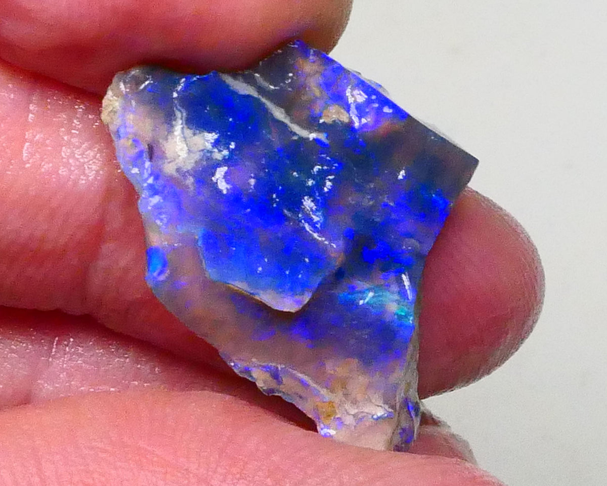 Gorgeous Bright Royal Blues on this Black seam opal rough to cut 8.60cts Lightning Ridge Material 27x18x6mm  Lot B4-A623