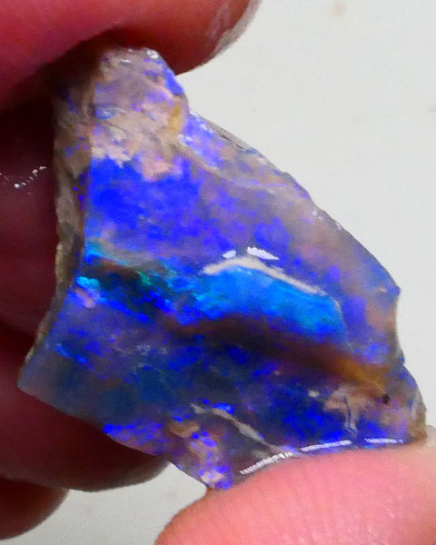 Gorgeous Bright Royal Blues on this Black seam opal rough to cut 8.60cts Lightning Ridge Material 27x18x6mm  Lot B4-A623