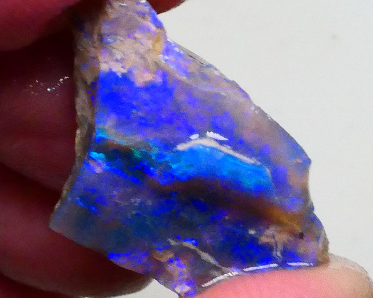 Gorgeous Bright Royal Blues on this Black seam opal rough to cut 8.60cts Lightning Ridge Material 27x18x6mm  Lot B4-A623