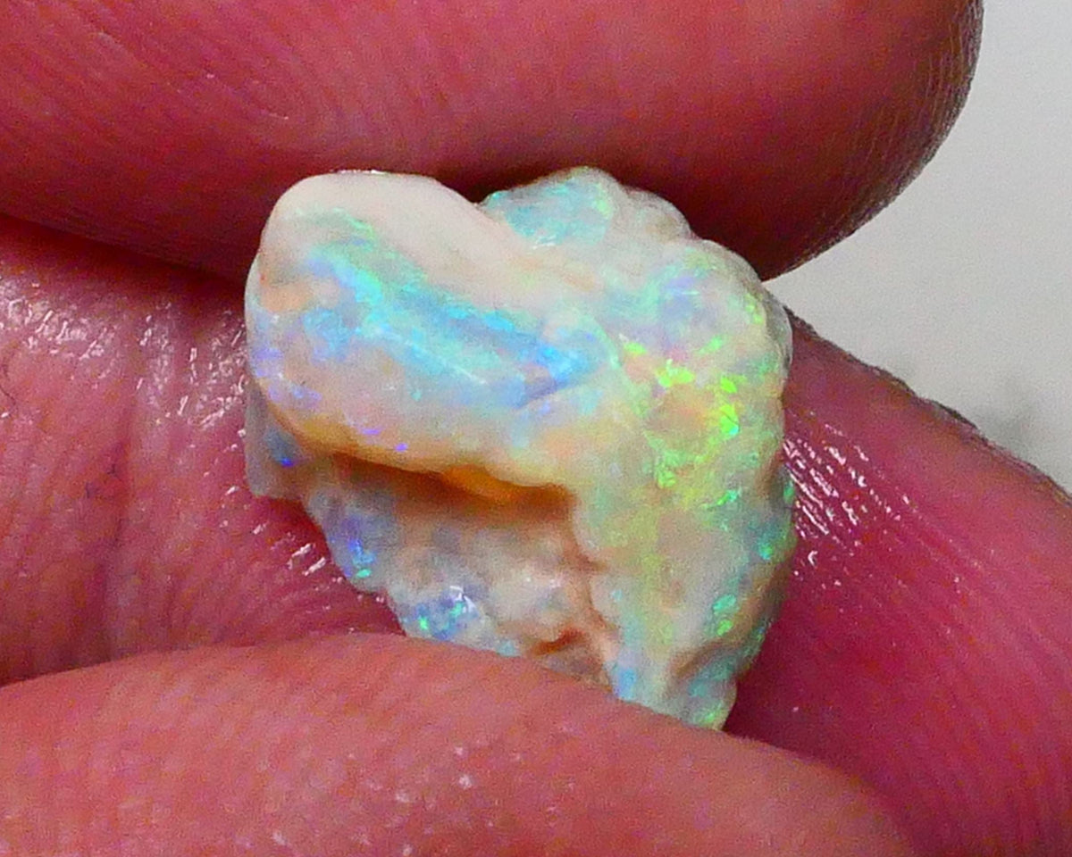 Yellow/blue/green dominant Multifires to cut 6.35cts Lightning Ridge knobby opal rough 13x10x9mm Lot B4-A628
