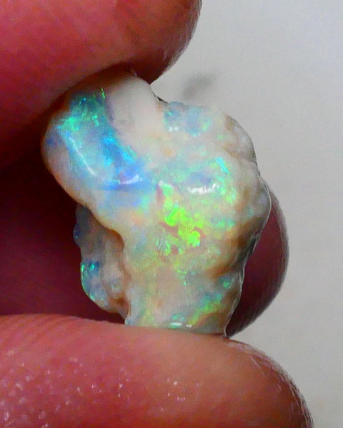 Yellow/blue/green dominant Multifires to cut 6.35cts Lightning Ridge knobby opal rough 13x10x9mm Lot B4-A628