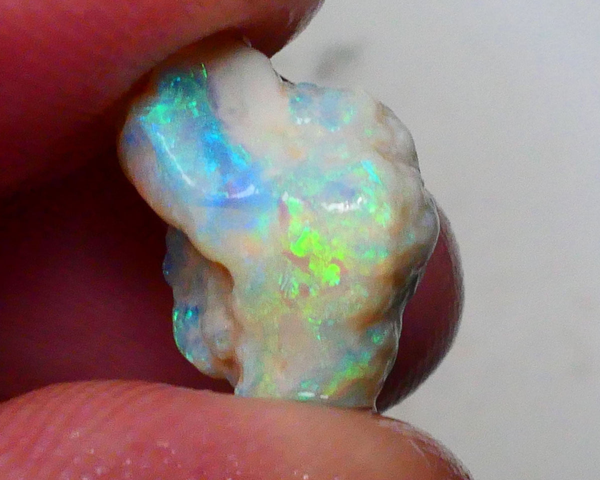 Yellow/blue/green dominant Multifires to cut 6.35cts Lightning Ridge knobby opal rough 13x10x9mm Lot B4-A628