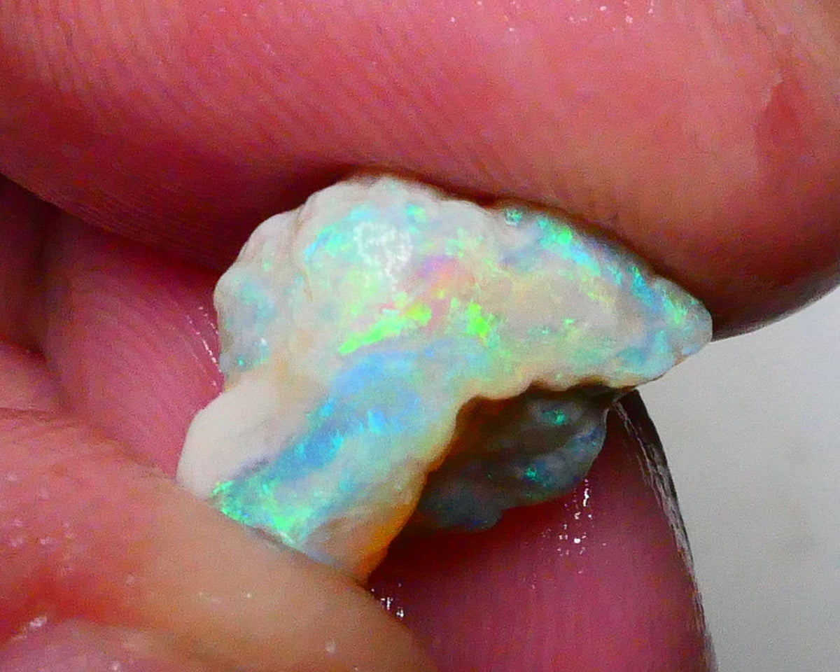 Yellow/blue/green dominant Multifires to cut 6.35cts Lightning Ridge knobby opal rough 13x10x9mm Lot B4-A628