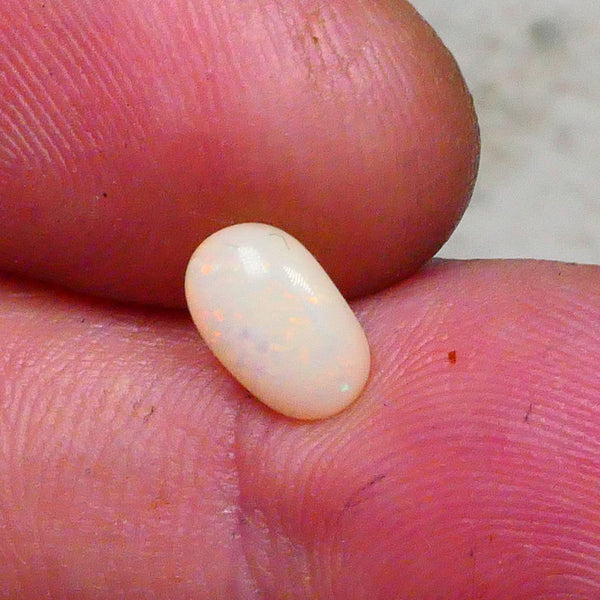 Lightning Ridge Light base polished Gemstone 1.00cts Pin Fires oranges & yellows 8x5x3.5mm ready to set Lot B4-A645