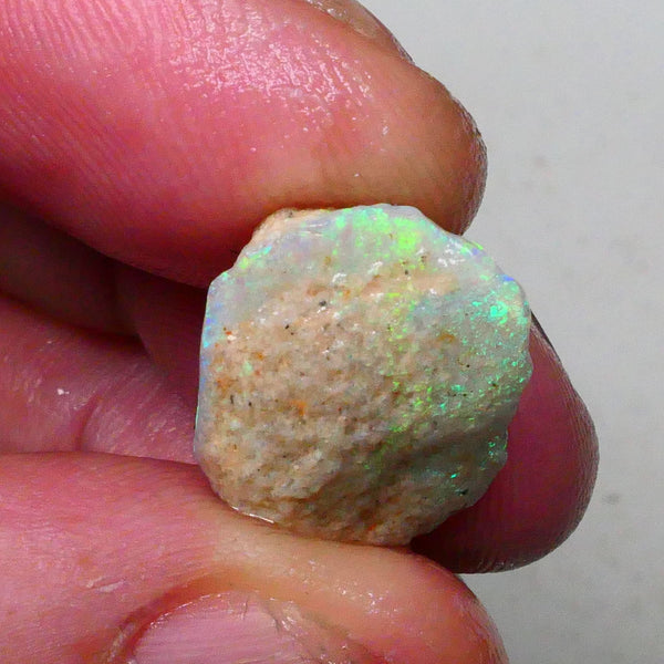 Bright Gorgeous Multicolour opal formation rough 7.50cts Fires visible in bar and top skin to cut 17x15x9mm  Lot B4-A653